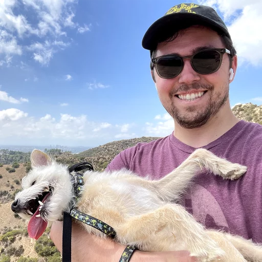A photo of Austin Poor and his dog, Sandwich hiking in California.